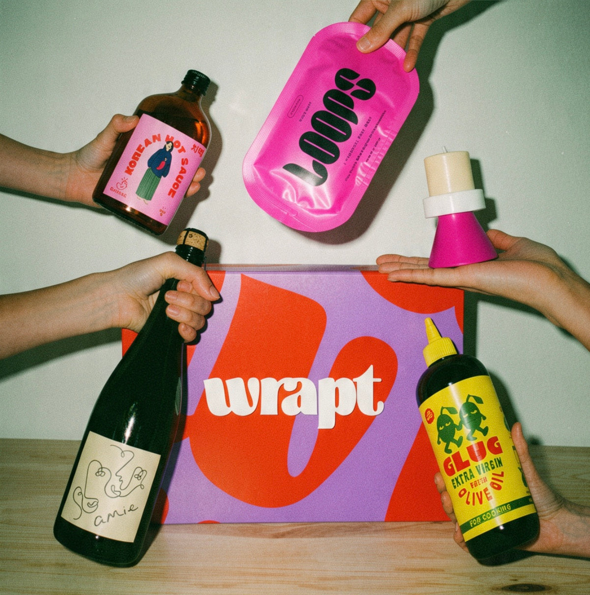 An open Wrapt box with indie products inside