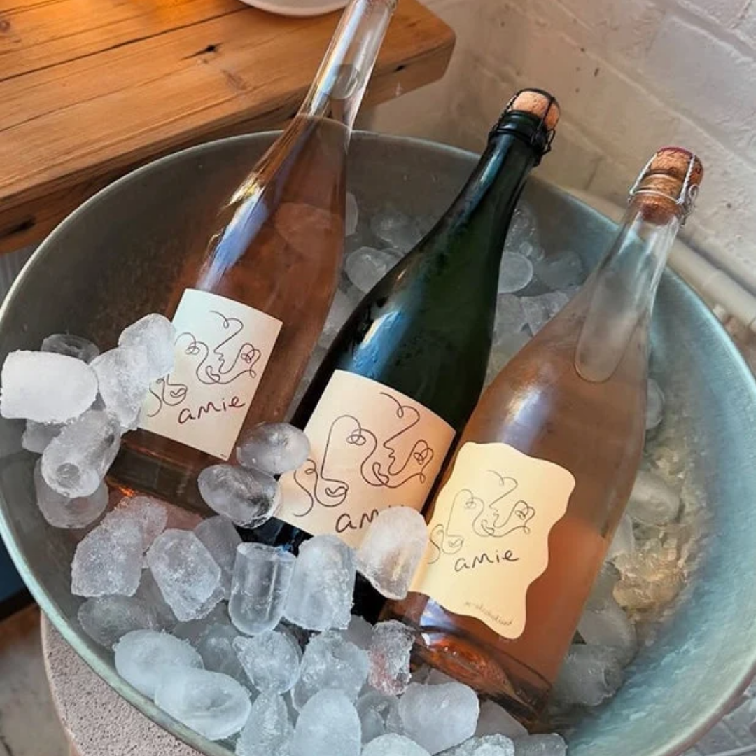 Bottles of Amie wine in an ice bucket