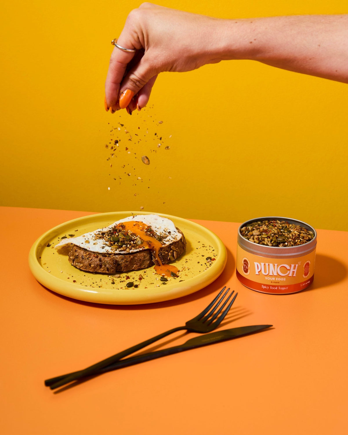 PUNCH Your Eggs sprinkled over eggs on toast
